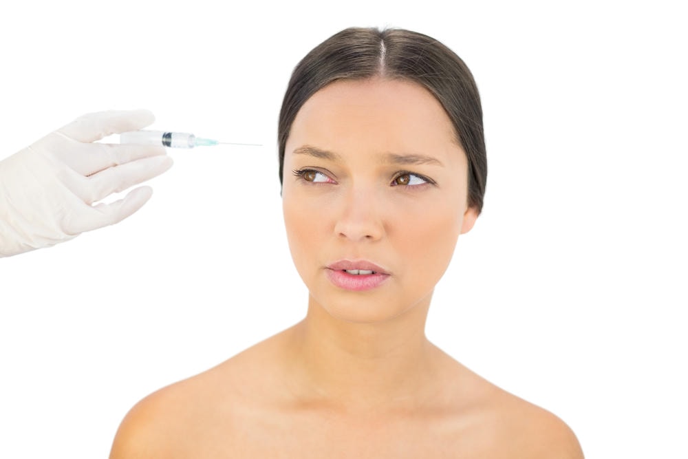 tiêm tan filler bao lâu thì hết sưng. Người mẫu trần trụi lo lắng đang tiêm botox